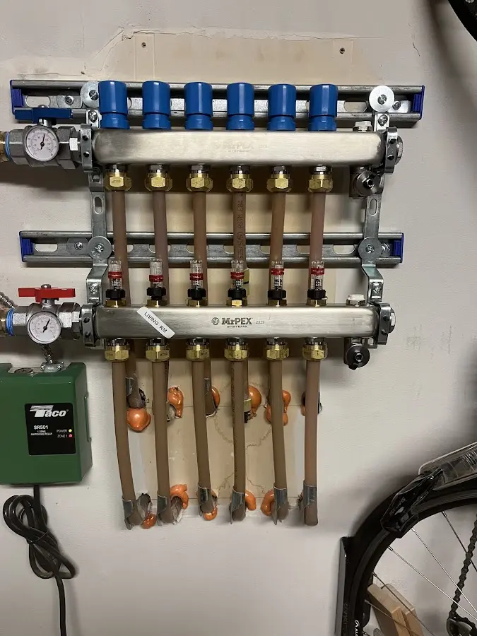 Plumber performing Gas Line Installation at a residential property in Spirit Lake